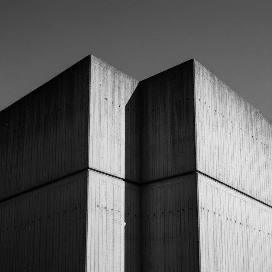 Brutalist concrete towers against the sky